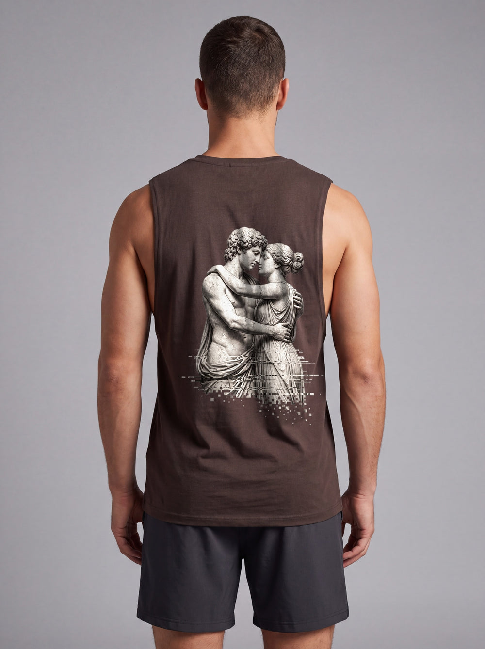 The Embrace Performance Tank in Espresso Brown, back view showing the full-width greyscale sculpture print