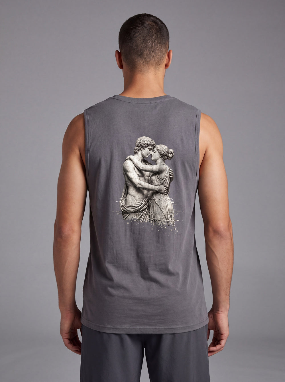 The Embrace Performance Tank in Graphite Gray, back view showing the full-width greyscale sculpture print